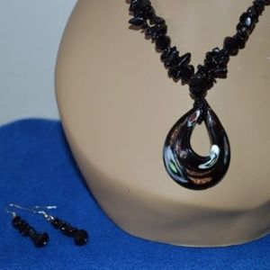 Black beaded necklace and earrings.